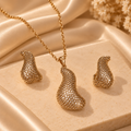 Golden Sculpted Teardrop Pendant & Earring Set
